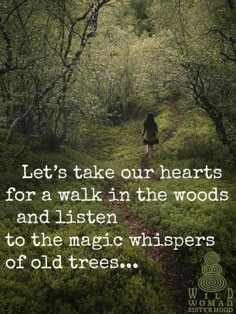 a woman walking down a path in the woods with an inspirational quote about new year ahead