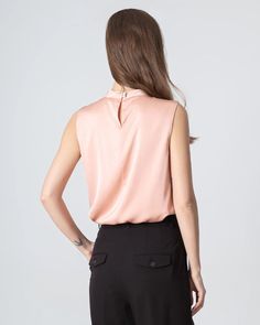 Type: Women's Tie Neck Blouse.Material: 19 Momme Luxury Mulberry Silk.Details: Classic Solid Color, Designed Sleeveless, Tie Neck, Regular Fit. Introducing our sleeveless silk blouse for women—a versatile essential that effortlessly transitions from formal to casual. Crafted from luxurious silk fabric, the top features a v neckline and a front tie for customizable styling. Whether you prefer a classic knot or a playful bow, this v-neck silk top is perfect for any occasion. Dress it up with tailo Business Formal, Tie Neck Blouse, Front Tie Top, Womens Tie, Silk Shirt, Mulberry Silk, Mozambique, Silk Blouse, Silk Fabric