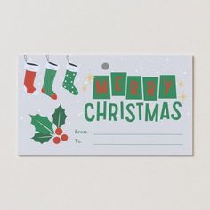 a merry christmas gift card with stockings and stockings hanging from the top, on a white background