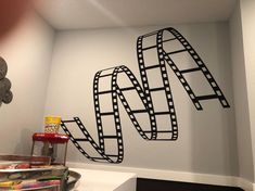 a film strip wall decal in the corner of a room