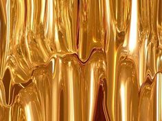 an abstract gold background with wavy lines