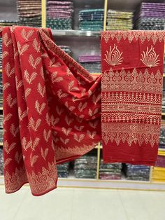 This is a beautiful organic cotton saree with handblock printed design  Fabric - Cotton Color - Rusty red  Technique - Hand block printed. Saree length - 5.5 mtr. Blouse - 1 mtr. Running but plain . Easy wash and care . Please note - color may be vary a little due to sunlight and photography . Please message us after purchasing in case you want fall and Pico done it not . No extra charges for fall and Pico but inform us . Blouse stitching is also available . Red Block Print Traditional Wear For Navratri, Red Cotton Silk Traditional Wear With Block Print, Red Chanderi Saree With Block Print, Red Kalamkari Print Traditional Wear In Cotton Silk, Red Cotton Silk Traditional Wear With Kalamkari Print, Red Block Print Dupatta For Navratri, Cotton Dupatta With Printed Border, Red Chanderi Dupatta With Printed Motifs, Festive Cotton Traditional Wear With Batik Print