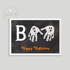 two handprinted halloween greetings with the words boo happy halloween