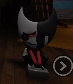 an animated character sitting on top of a wooden floor