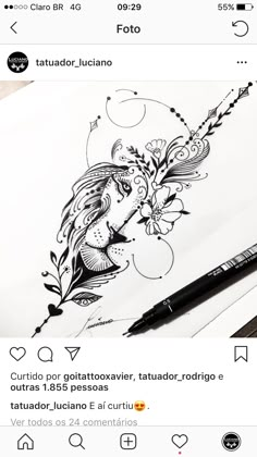 an image of a drawing on paper with a pen next to it and the caption in spanish