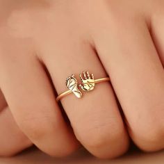 Material:  18K solid gold, Au750 stamped Ring band width: 1.1mm approx  Custom made process:  1. Measure your finger size accurately and precisely.  2. Place the order and leave us a note at checkout of your finger size. 2. Send us high resolution photos of your baby's footprint and handprint. 3. We will provide mockup for your review before send off for production. -------------Shipping--------------------- We ship all our jewellery from London,  UK.  We aim to dispatch your jewellery within 3- Gold Coin Jewelry, New Mum Gift, Gold Finger Rings, Stamped Ring, Stamped Rings, Baby Footprints, Gift For Mum, Gold Coin, Finger Rings