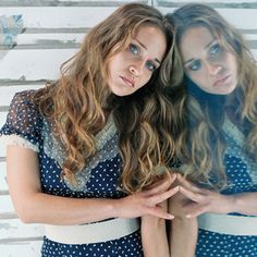 two young women standing next to each other