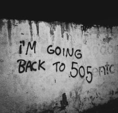 graffiti written on the side of a wall that says i'm going back to 50 cents