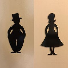 the silhouettes of two people are next to each other, one with a top hat and dress