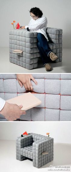 a man sitting on top of a couch made out of blocks