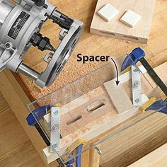 a router is being used to cut wood with a viset and plunger