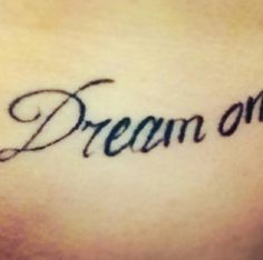 a tattoo with the word dream on it's chest and writing below that reads,