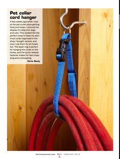 a magazine page with an image of a red hose and a blue leash attached to it