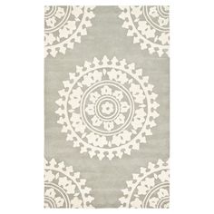 a gray and white rug with an intricate design