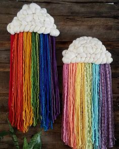 two rainbows made out of yarn are sitting next to each other