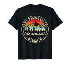 a black t - shirt with an image of the mountains and trees that says mtp bachelor