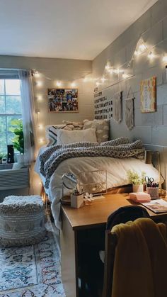 a bedroom with lights strung from the ceiling