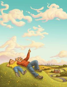 a man laying on top of a lush green field next to a sky filled with clouds