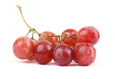 a bunch of red grapes sitting on top of each other