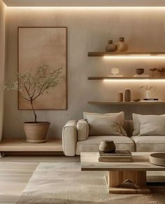 a living room filled with lots of furniture next to a wall mounted shelf and potted plant