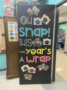 a sign that says, oh snap this year's a wrap on the door