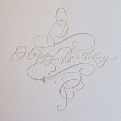 a birthday card with the words happy birthday written in cursive writing on it