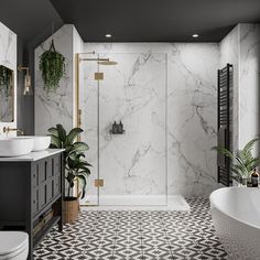 a bathroom with black and white tile flooring next to a bathtub, toilet and sink