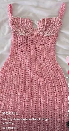 a pink knitted dress with ruffles on the shoulders and neckline is featured in this knitting pattern