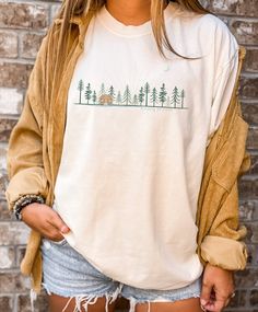 Pine Tree Shirt Vintage Style Cabin in the Woods Shirt Secluded Cabin Shirt Sunrise Cabin Tee Gift For the Cabin Weekend Shirt Comfort Color by FindingGrowthShop on Etsy Camping T Shirt, Outdoorsy Clothes, Cabin Clothes, 20’s Style, Cabin Weekend, Forest Clothes, Secluded Cabin, Camping Shirts, Cabin In The Woods