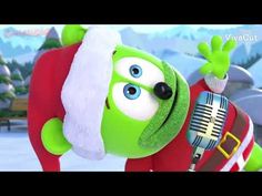 an animated character wearing a santa hat and holding a microphone