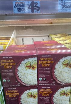 three boxes of organic jasmine rice on display