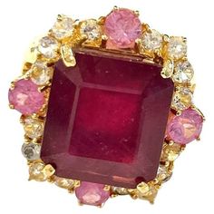 Bochic "Orient” Red Ruby & Multi Sapphire Cocktail Ring Set 18K Gold & Silver Red Natural Ruby Square Cut - 14 Carats White Diamonds - 1.50 Carat Pink Sapphires - 4 Carat This Ring is from the "Capri" traveling collection and it is the epitome of elegance and versatility. The ring offers a perfect blend for day to night and swimwear to evening wear, allowing you to effortlessly transition between different occasions and outfits. Wearing this cocktail style ring will undoubtedly make you the cent Rose Gold Gemstone Ring, African Inspired Jewelry, Blessed Wednesday, Sapphire Cocktail Ring, Vintage Cocktail Ring, Mercedes Maybach, Multi Sapphire, Gold Gemstone Ring, Gold Cocktail Ring