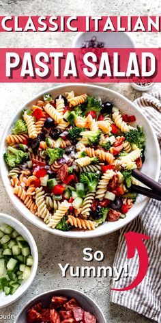 a bowl filled with pasta salad next to other bowls