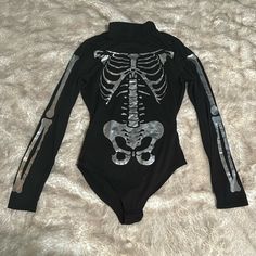 Long Sleeve Silver Metallic Skeleton Bodysuit. New Without Tags Silver Skeleton Costume, Goth Staples, Skeleton Bodysuit, Skeleton Costume, Tops Black, Walker Boots, Garment Bags, Black And Silver, Rain And Snow Boots