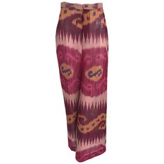 Ralph Laurent Collection, silk ikat printed wide leg trouser in silk chiffon. Beautiful and perfect for any occasion. Fly front, banded waist with button closure. Wide full legs. Sheer and unlined. Marked size 2. In excellent wearable condition. All our clothing is dry cleaned and inspected for condition and is ready to wear. Any condition issues will be noted. For visual comparison our mannequin is a size 4. Please check the measurements provided below and compare with your own measurements for Bohemian Silk Wide-leg Pants, Bohemian Silk Wide Leg Pants, Bohemian Wide Leg Silk Pants, Elegant Ralph Lauren Wide-leg Pants, Chic Ralph Lauren Wide-leg Pants, Elegant Multicolor Silk Bottoms, Elegant Ralph Lauren Wide Leg Pants, Ralph Lauren Elegant Wide Leg Pants, Chic Ralph Lauren High-waisted Pants