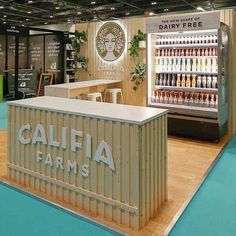 the interior of a dairy free store with an ice cream counter and display case filled with drinks