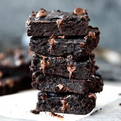 chocolate brownies stacked on top of each other