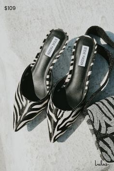 Finish off your OOTD with the ultra-stylish addition of the Steve Madden Micki-Z Zebra Calf Hair Leather Kitten Heel Mule Pumps! Sleek, genuine calf hair (with a black and white zebra print throughout) shapes these chic pumps with a classy pointed-toe upper and a low-cut collar. The effortless slide-on design sits atop a low, sculpted spool heel! 2. 25" sculpted spool heel. Cushioned insole. Rubber sole has nonskid markings. Genuine leather upper and sock. Synthetic lining. Balance man made materials. Imported. Lulus | Micki-Z Zebra Calf Hair Leather Kitten Heel Mule Pumps. Mule Pumps, Spool Heel, White Zebra, Shoes Heels Pumps, Calf Hair, Kitten Heel, Mules Shoes, Zebra Print, Pump Shoes