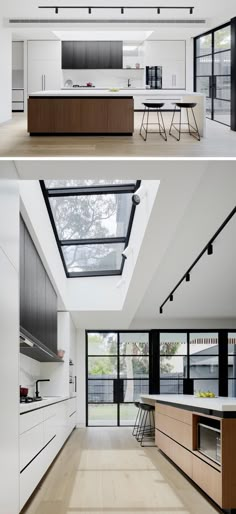 the kitchen and dining room are separated by an open skylight