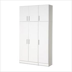 a tall white cabinet with two doors