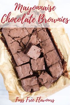 chocolate brownies cut into squares on top of parchment paper with the words mayonaise chocolate brownies