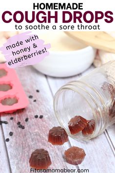 homemade cough drops made with honey and elderberries in a jar on a wooden table