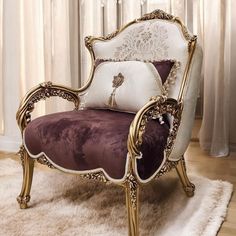 a fancy chair sitting on top of a white rug