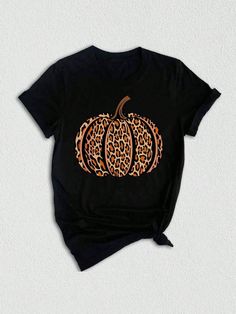 Introducing our exclusive collection of Mom shirts, perfect for celebrating the fall season and expressing your love for family and fun!  Our Pumpkin Shirt is the must-have addition to your fall wardrobe. With its unique design featuring a vibrant pumpkin, it pays homage to the harvest season and brings forth a sense of warmth and gratitude.  Suitable for both Thanks Giving festivities and everyday wear, this Family Funny Shirt will bring smiles all around. Its playful design captures the essenc Cute Pre-shrunk Shirt For Fall, Fun Black Shirt As Gift, Fun Black Shirt As A Gift, Family Matching Black Tops For Fall, Black Family Matching Tops For Fall, Brown Graphic Print T-shirt For Fall, Fun Fall T-shirt With Funny Print, Casual Shirt With Funny Print For Fall, Fall Funny Print Short Sleeve Tops