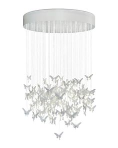 a white chandelier with butterflies hanging from it's center circle and rain drops falling off the ceiling