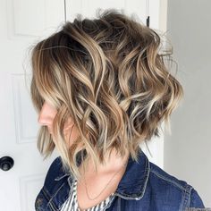 Wavy Inverted Bob with Defined Inverted Bob Hairstyles Wavy Hair, Wavy Inverted Bob Hairstyles, Long Curly Inverted Bob Hairstyles, Inverted Wavy Bob, Inverted Wavy Bob Hairstyles, Asymmetrical Wavy Bob Medium, Inverted Curly Bob With Bangs, Wavy Hair Inverted Bob, Inverted Long Curly Bob