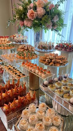 an assortment of pastries and desserts on display