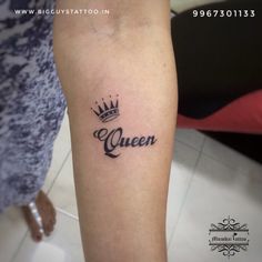 a woman's leg with a tattoo on it that reads queen and has a crown