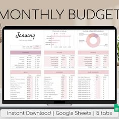 an image of a laptop with the text, month by month budget sheet on it