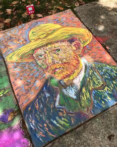 a painting of a man wearing a hat on the sidewalk in front of some leaves